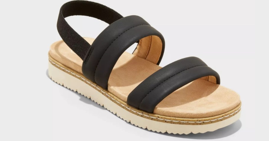 a girls black and tan strappy sandal