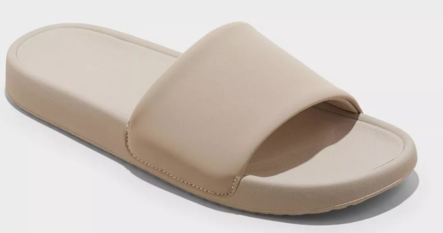 a women's tan color slide sandal