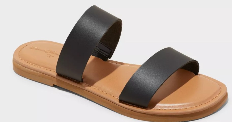a women's tan and black double strap sandal