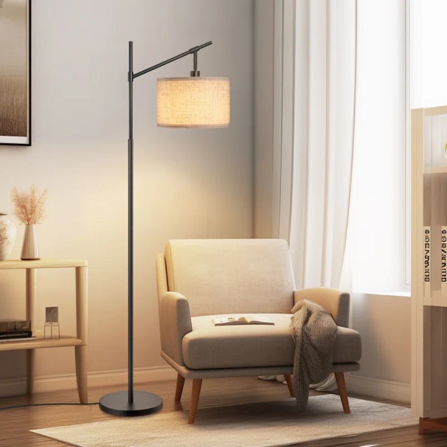 floor lamp in living room next to accent chair