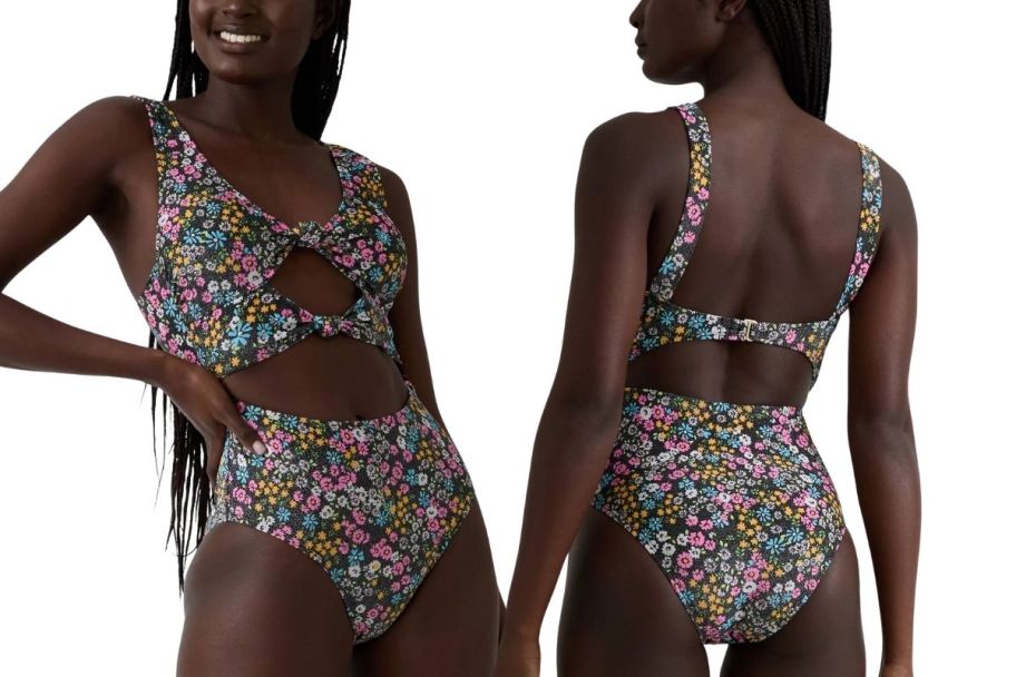 a model in floral print 1 piece swimsuit