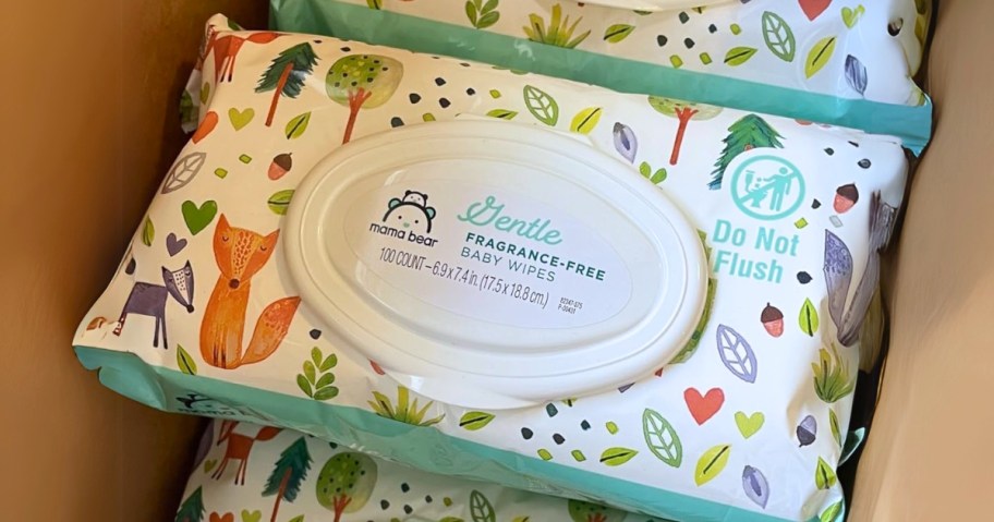 a box with packs of Mama Bear Gentle Baby Wipes