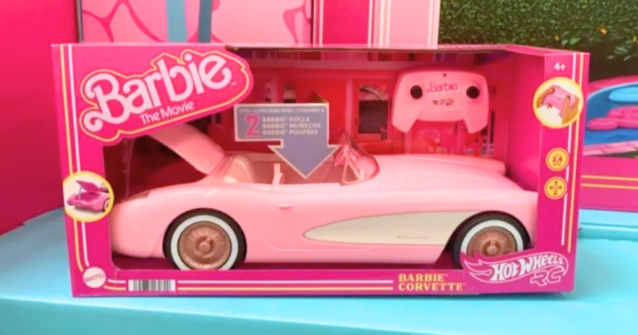 a pink Barbie Corvette remote control car in the packaging on a shelf
