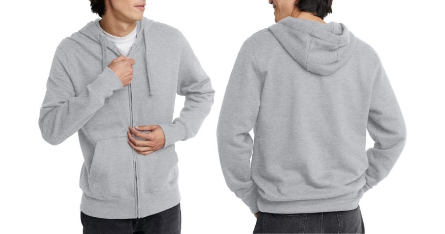A man wearing a gray sweatshirt
