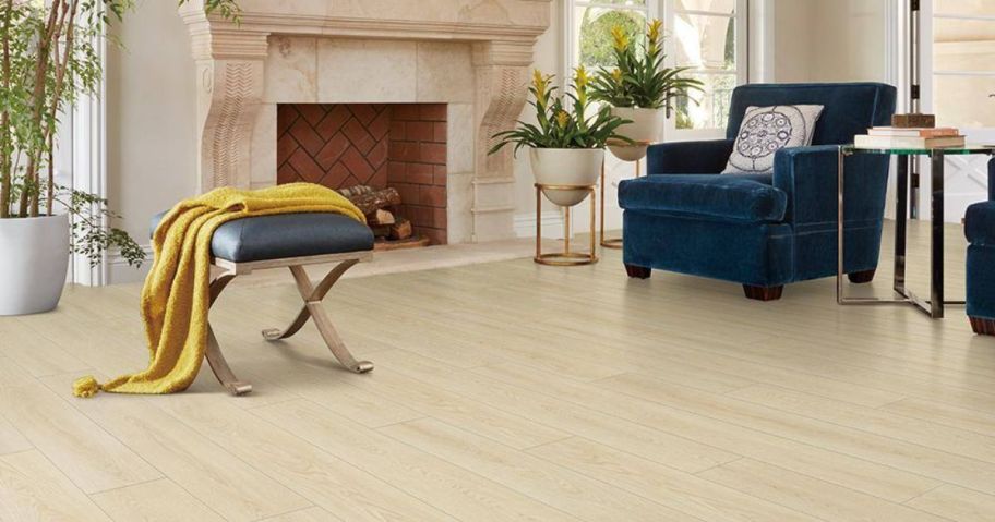 A room with a light colored wood flooring 