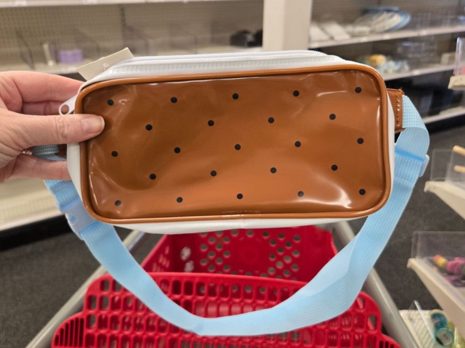 watermelon print fanny pack in hand in store