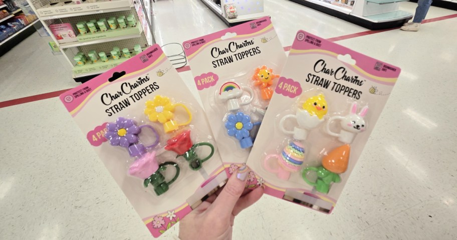 assorted charcharms straw toppers in hand