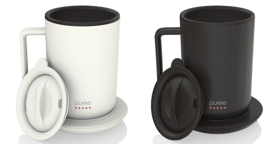 a white and a black Tzumi Puree Warming Coffee Mug stock image