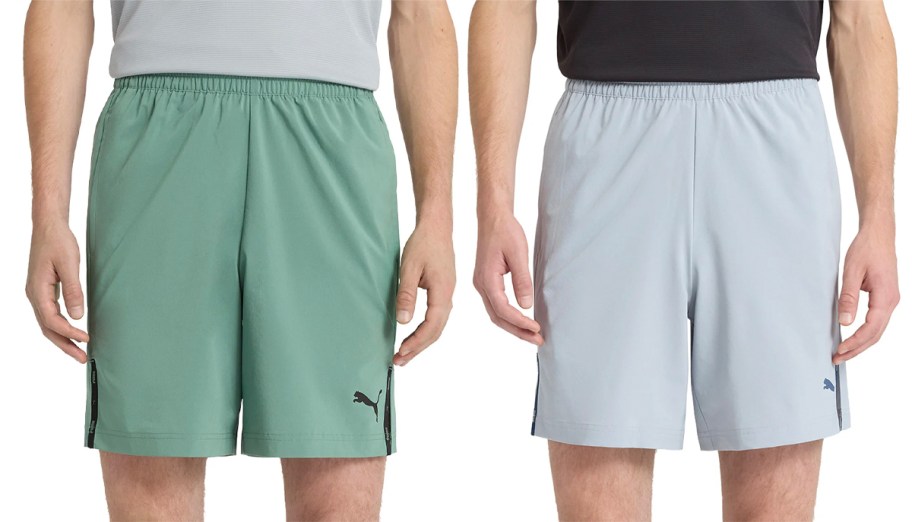 two men wearing green and gray puma shorts