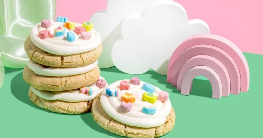 stack of crumble cookies with white icing and lucky charms cookies