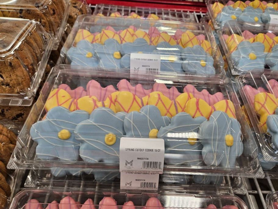 pink, yellow, and blue Spring Cutout Cookies in container in store
