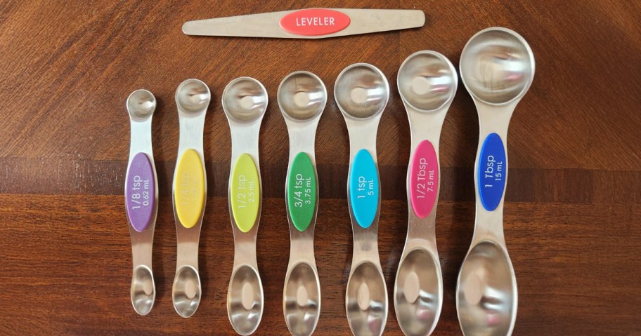 silver measuring spoon set on a table