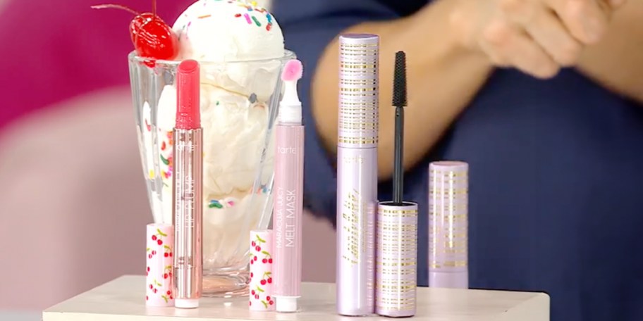three tarte products sitting on table with ice cream behind it 