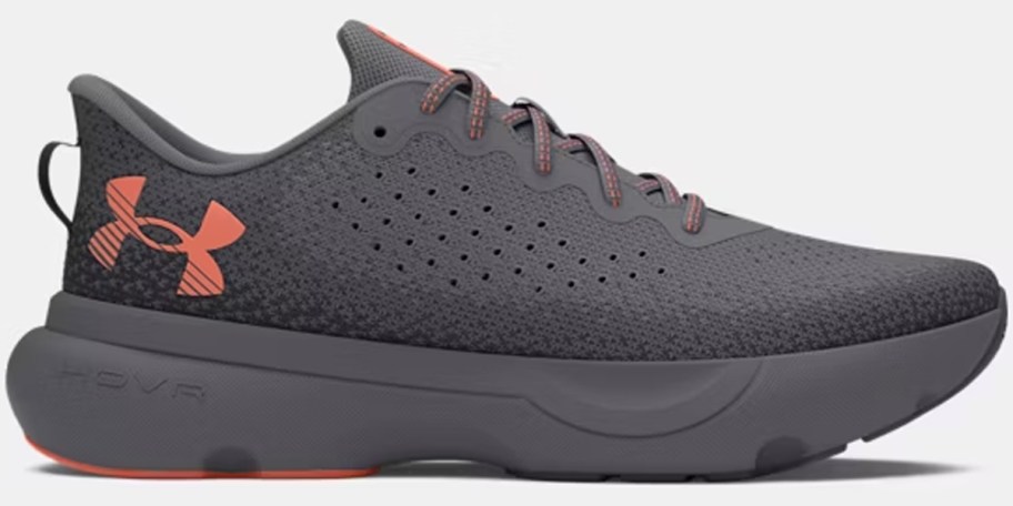 gray and orange under armour shoe