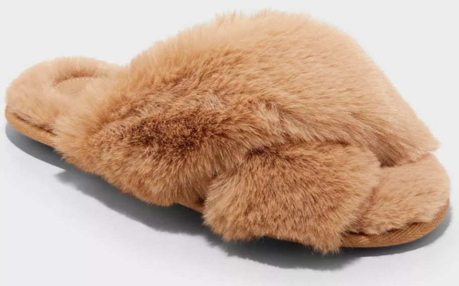 a tan criss cross fuzzy women's slipper