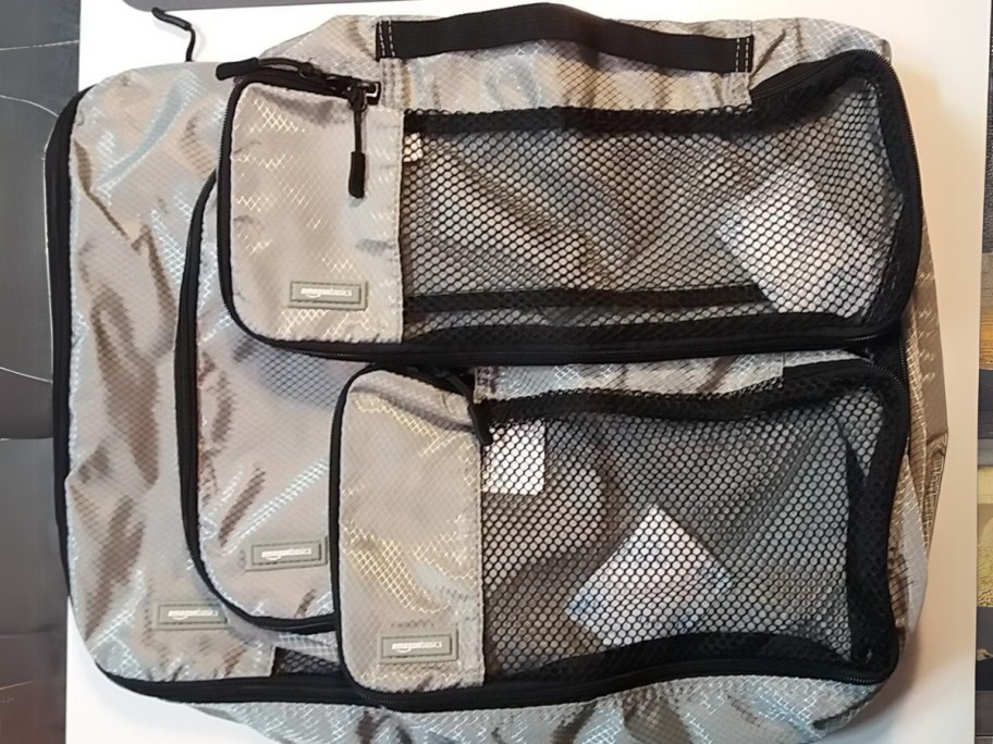 4 empty travel cubes on a table