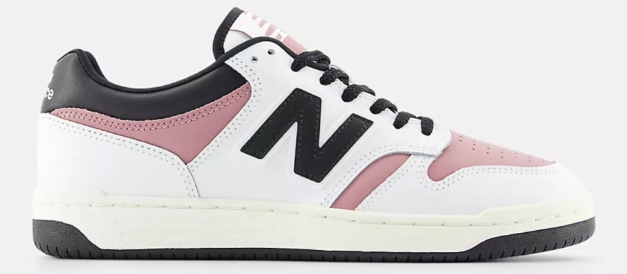 a white, pink, and black adults New Balance sneaker