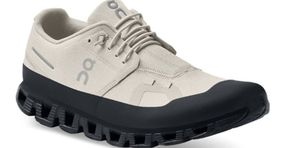 a khaki and black On running shoe