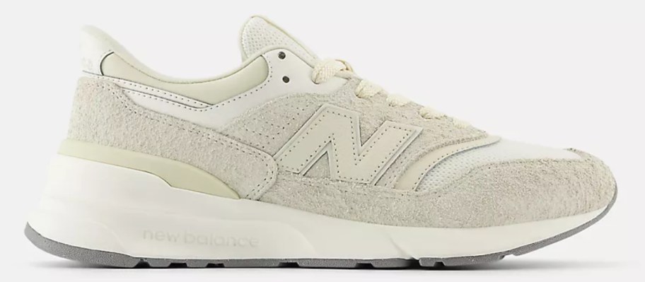 an off white adults New Balance sneaker