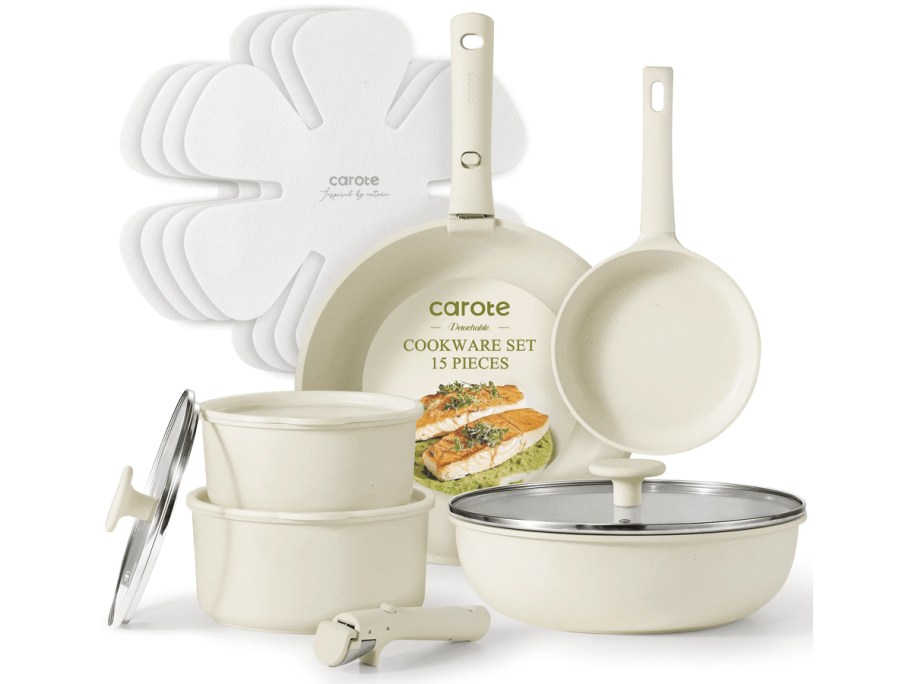 Cream-colored Carote 15-piece nonstick cookware set with detachable handle, multiple pots and pans, glass lids, and pan protectors arranged neatly.