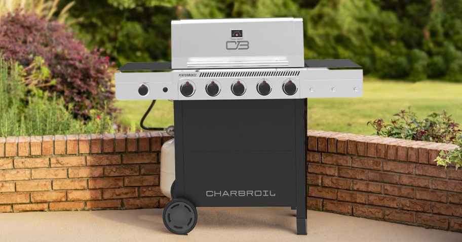 black and silver gas grill on patio