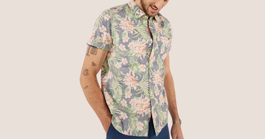 man wearing chubbies button down shirt with floral print