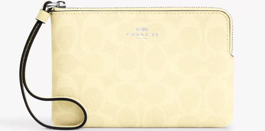 light yellow coach wristlet