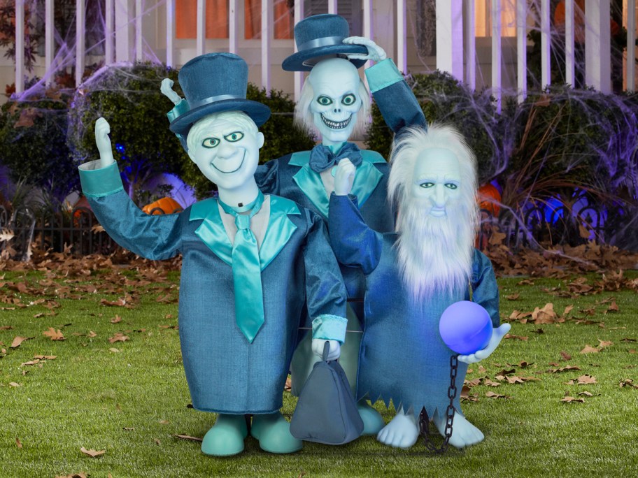 Haunted Mansion Hitchhiking Ghosts decoration on lawn