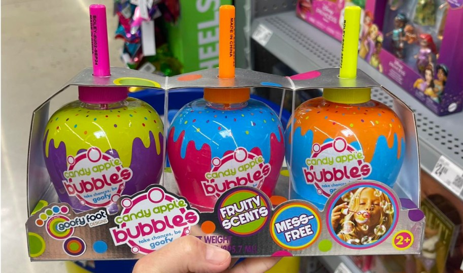 hand holding Goofy Foot Candy Apple Bubbles 3-Pack at the store