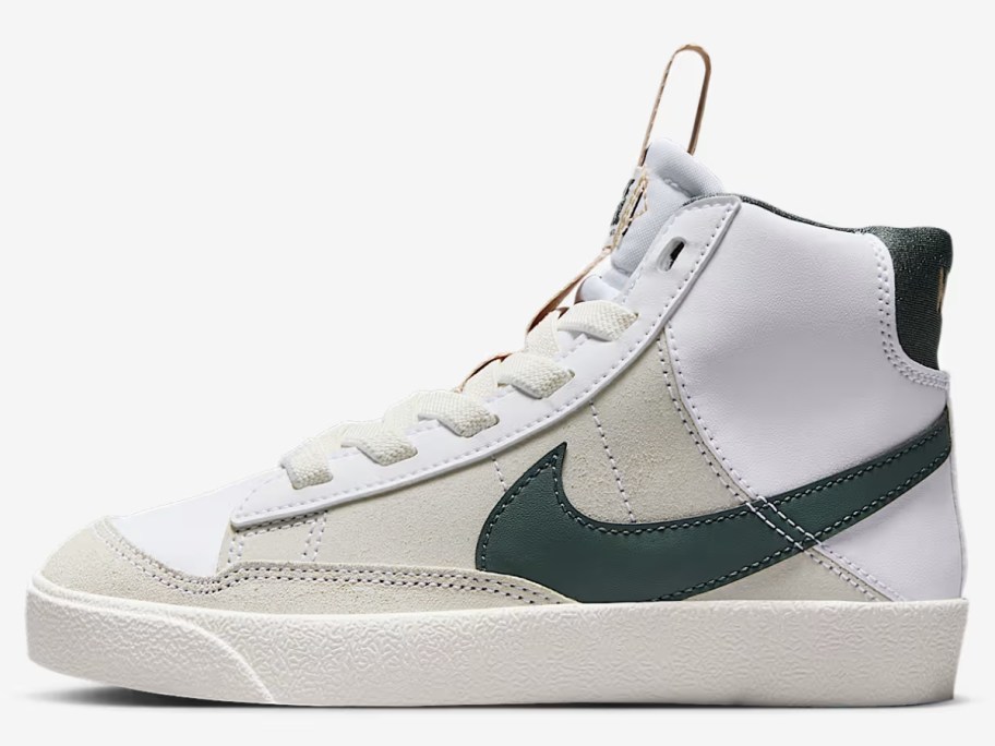 a Nike Blazer mid shoe in white with green and grey accents