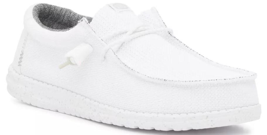 all white slip on sneaker