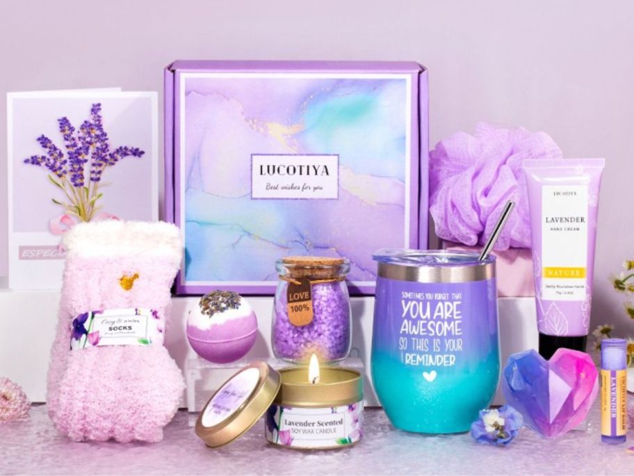 A Spa Gift Set box in Purple with various self-care items around it