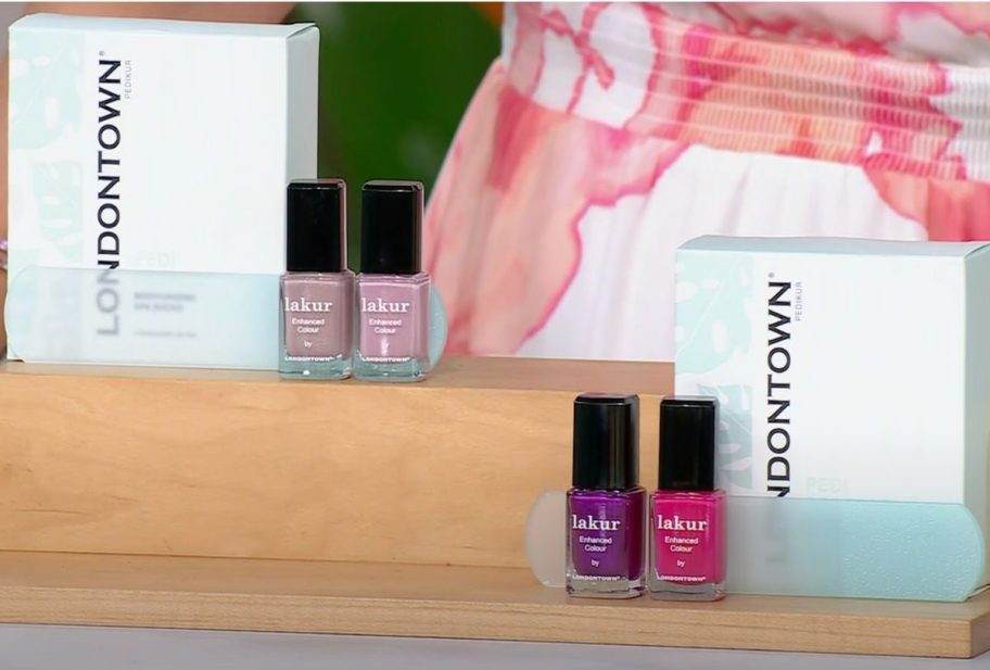 Two londontown nail sets with two polish, a foot file and pedi socks