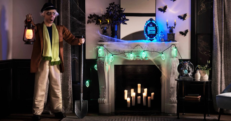 Haunted Mansion Halloween decor in living room around a fire place