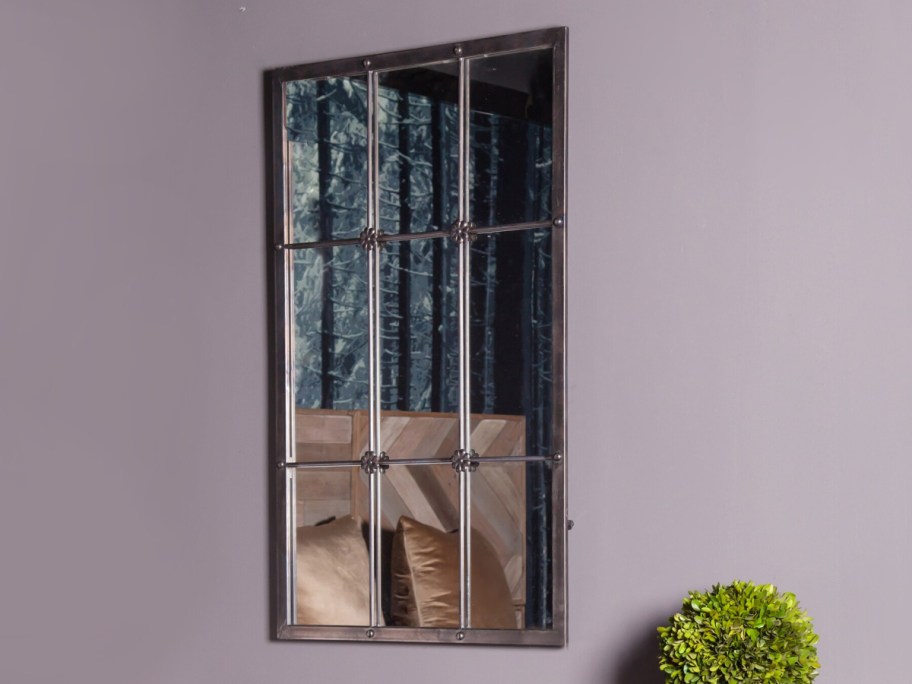 large rectangle framed wall mirror displayed
