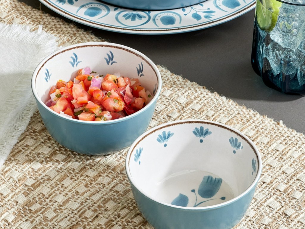 glass dip bowls filled with salsa on table