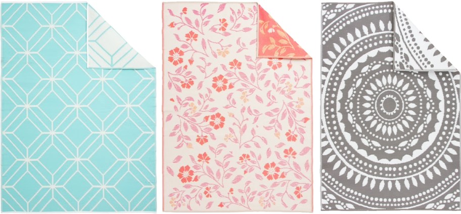 blue, pink, and grey printed reversible rugs