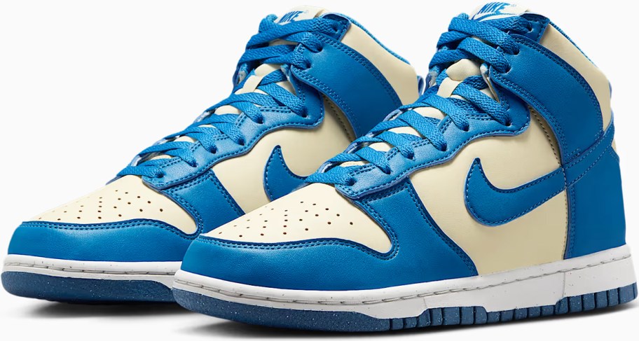 pair of blue and off-white nike high top sneakers