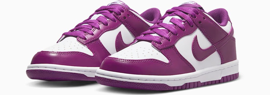 pair of purple and white nike sneakers