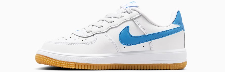 white and blue nike sneaker