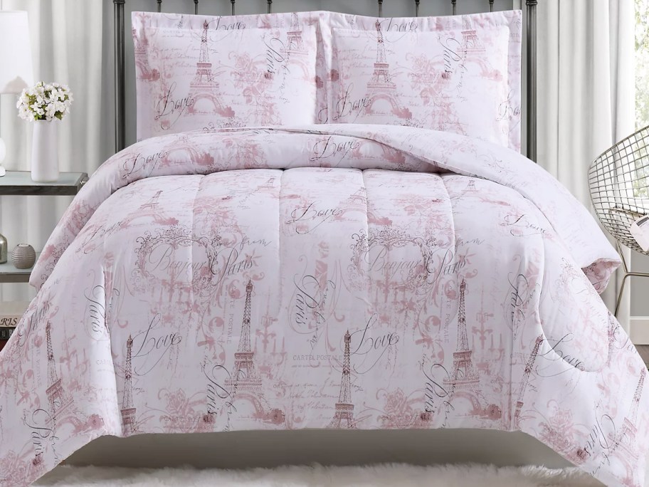 paris print comforter on bed with matching pillow shams