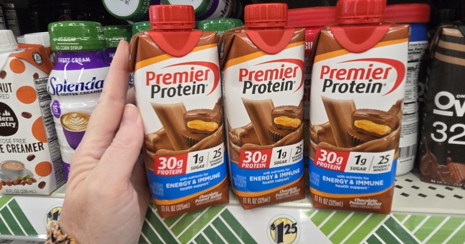 chocolate peanut butter premier protein shake bottles on dollar tree shelf