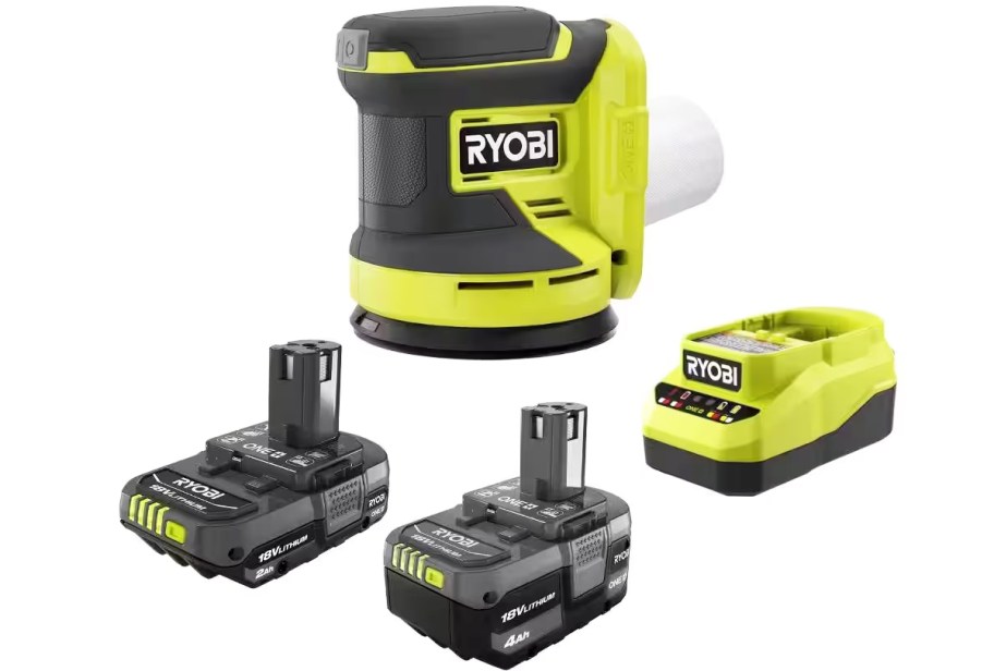 green and black orbital sander, two black batteries, and a charger