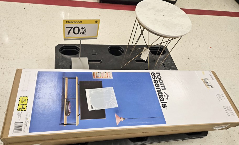Room Essentials TV Stand and accent table on pallet with 70% off clearance sign