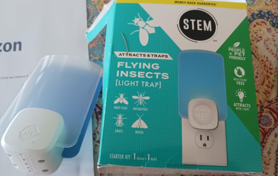 STEM flying trap light and kit next to each other