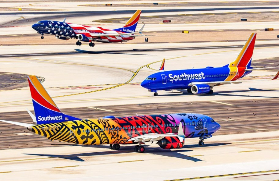 three Southwest Airlines planes on runway