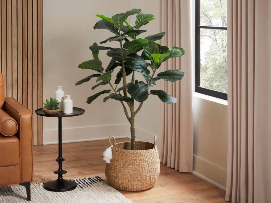 Stylewell Fiddle Leaf Fig Faux Tree in the orner of a room near a window