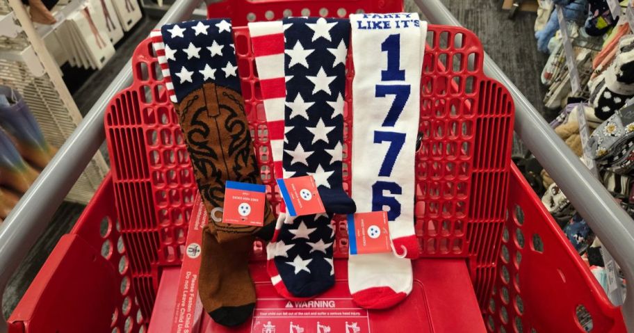 A person showing 4th of July socks at Target