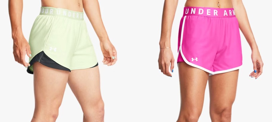 two women in light green and pink under armour shorts