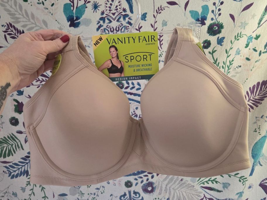 Hand holding a Vanity Fair Medium Impact Wireless Sports Bra